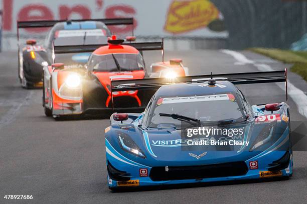 The Corvette DP of Michael Valiante and Richard Westbrook leads a pack of cars during the Sahlen's Six Hours of the Glen at Watkins Glen...