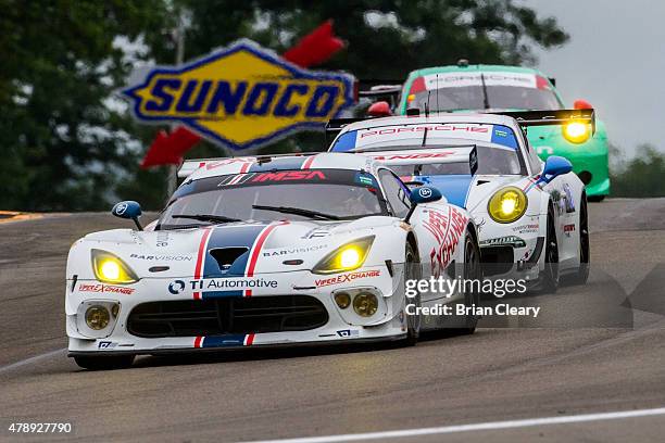 The Dodge Viper of Marc Goosens, Al Carter and Cameron Lawrence leads a pack of cars during the Sahlen's Six Hours of the Glen at Watkins Glen...