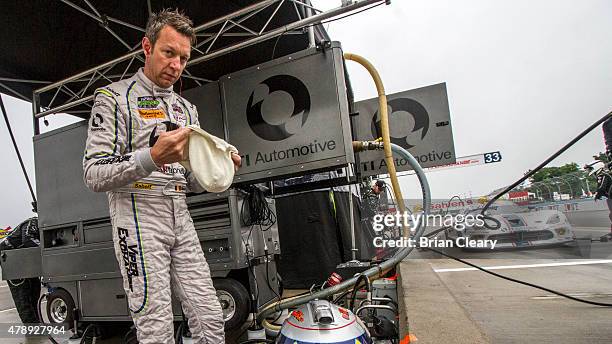 Marc Goosens is shown in the pits before the Sahlen's Six Hours of the Glen at Watkins Glen International on June 28, 2015 in Watkins Glen, New York.