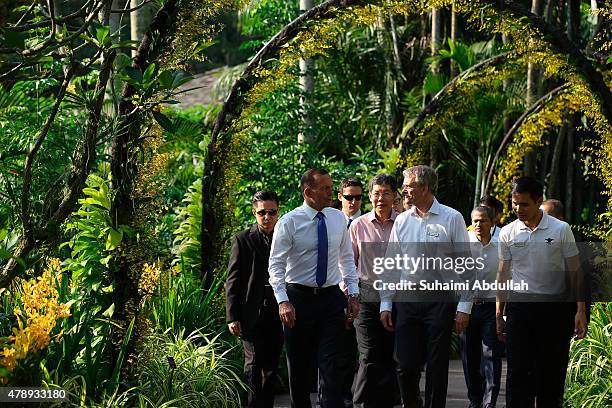 Australian Prime Minister Tony Abbott tours the orchid garden at the National Orchid Garden on June 29, 2015 in Singapore. Australian Prime Minister...