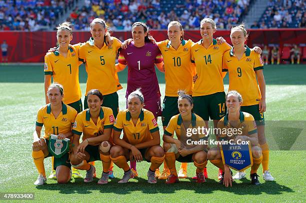 Australia poses for a team photo prior to the FIFA Women's World Cup Canada 2015 match between Australia and Nigeria at Winnipeg Stadium on June 12,...
