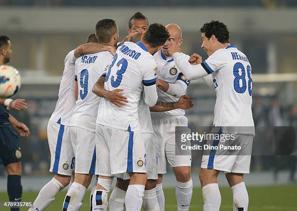 Cicero Moreira Jonathan of Internazionale is mobbed by team mates after scoring his team's second goal during the Serie A match between Hellas Verona...