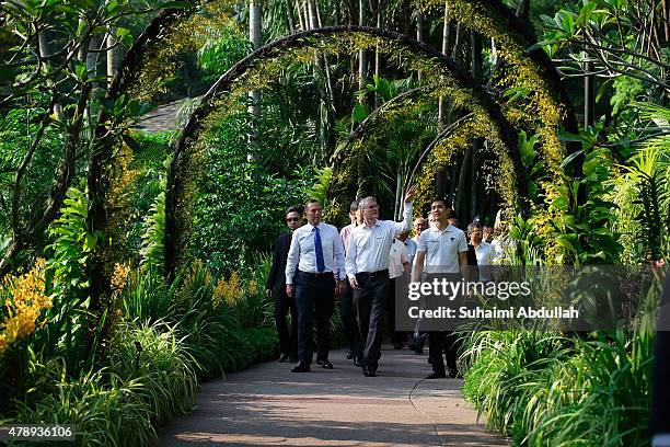 Australian Prime Minister Tony Abbott tours the orchid garden at the National Orchid Garden on June 29, 2015 in Singapore. Australian Prime Minister...