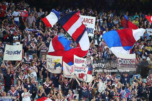 Roosters fans cheer their team during the round two NRL match between the Sydney Roosters and the Parramatta Eels at Allianz Stadium on March 15,...