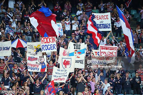 Roosters fans cheer their team during the round two NRL match between the Sydney Roosters and the Parramatta Eels at Allianz Stadium on March 15,...