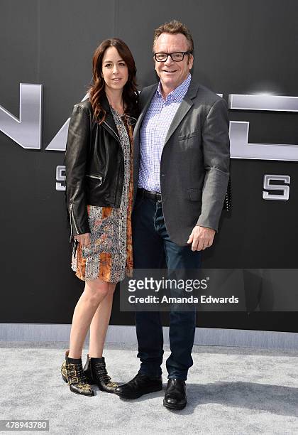 Actor Tom Arnold and his wife Ashley Groussman arrive at the Los Angeles premiere of "Terminator Genisys" at The Dolby Theatre on June 28, 2015 in...