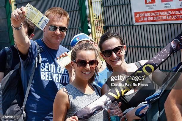 Some fans waiting to enter the Olympic Stadium for the concert of their favorite singer Vasco Rossi. Vasco Rossi, also known as Vasco or with the...