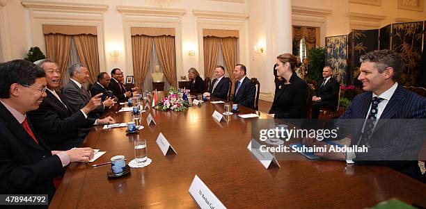 Australian Prime Minister Tony Abbott and Singapore Prime Minister Lee Hsien Loong chairs the delegation meeting at the Istana on June 29, 2015 in...