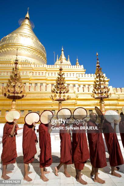 Buddhist novices in front of the Shwezigon pagoda during a festival in Bagan also called Pagan, Burma also called Myanmar.