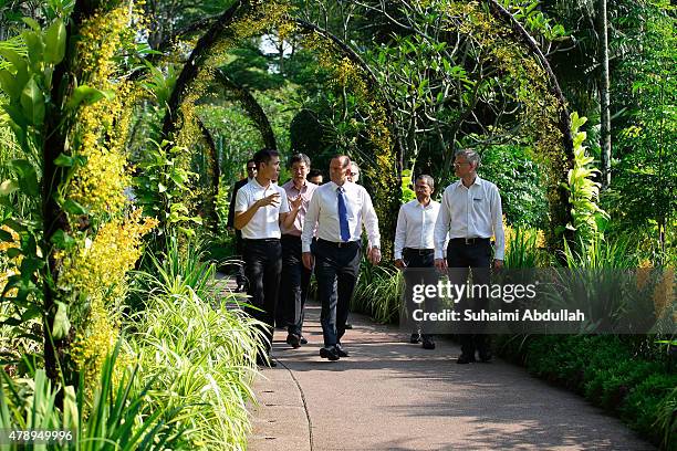 Australian Prime Minister Tony Abbott tours the orchid garden at the National Orchid Garden on June 29, 2015 in Singapore. Australian Prime Minister...