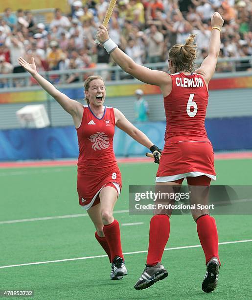 Mel Clewlow and Helen Richardson of Great Britain celebrate after scoring during the Women's Pool Hockey Match between Argentina and Great Britain...