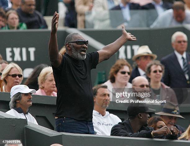 Richard Williams, father and coach of Serena Williams, show his emotion during her Women's Singles fourth round match between Serena Williams of USA...