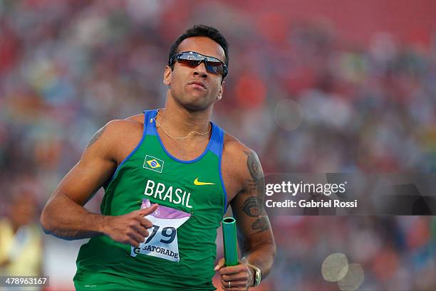 Bruno Lins Tenorio de Barros of Brazil crosses the finish line in Men's 4x100 relay during day nine of the X South American Games Santiago 2014 at...