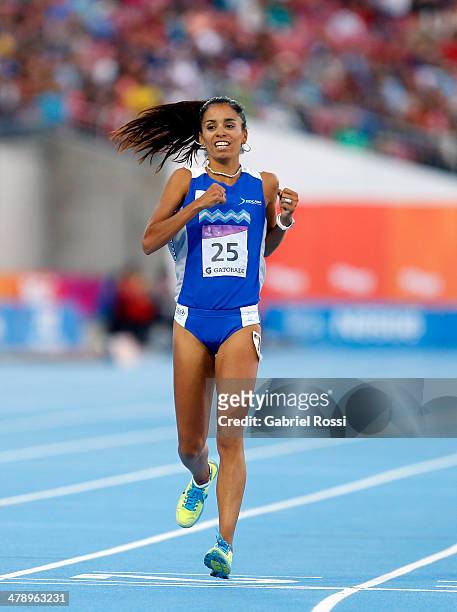 Maria De Los Angeles Peralta of Argentina competes in Women's 5,000m during day nine of the X South American Games Santiago 2014 at Estadio Nacional...