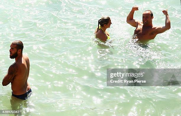 Lance Franklin of the Swans swims during a Sydney Swans AFL recovery session at Coogee Beach on March 16, 2014 in Sydney, Australia.