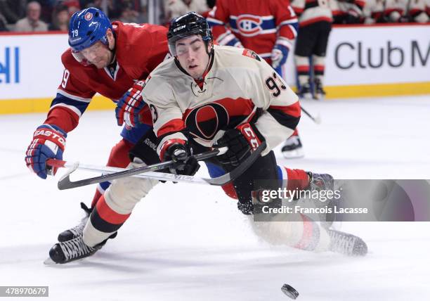Andrei Markov of the Montreal Canadiens and Mika Zibanejad of the Ottawa Senators battle for the puck during the NHL game on March 15, 2014 at the...