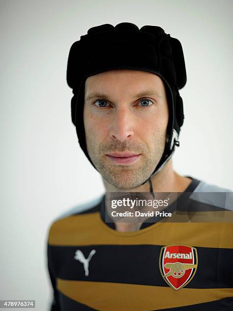 Petr Cech signs for Arsenal Football Club at the Arsenal Training Ground at London Colney on June 26, 2015 in St Albans, England.