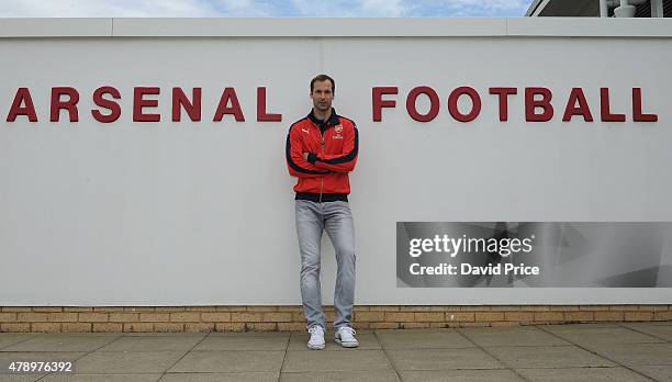 Petr Cech signs for Arsenal Football Club at the Arsenal Training Ground at London Colney on June 26, 2015 in St Albans, England.