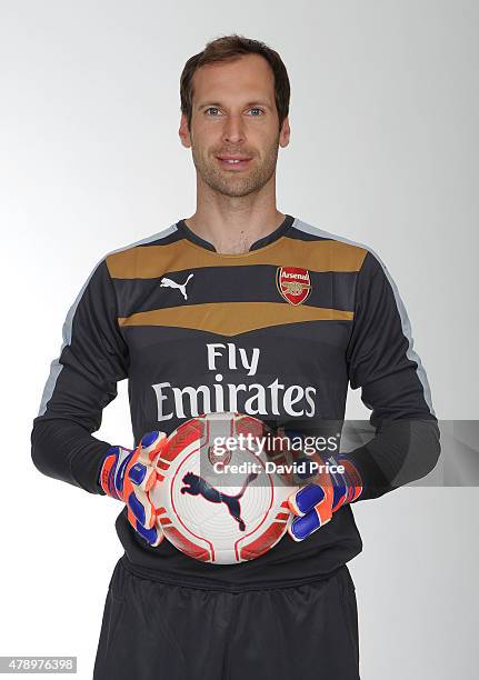 Petr Cech signs for Arsenal Football Club at the Arsenal Training Ground at London Colney on June 26, 2015 in St Albans, England.