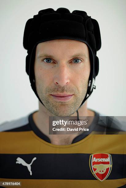 Petr Cech signs for Arsenal Football Club at the Arsenal Training Ground at London Colney on June 26, 2015 in St Albans, England.