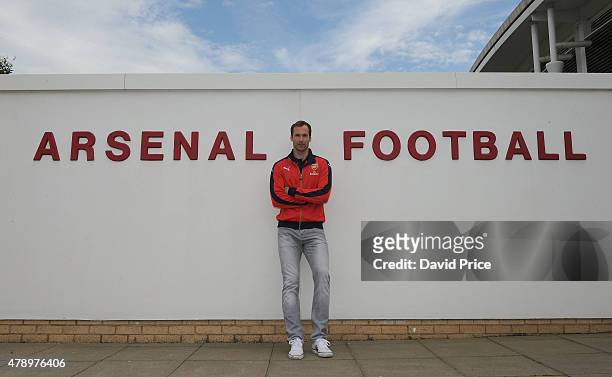 Petr Cech signs for Arsenal Football Club at the Arsenal Training Ground at London Colney on June 26, 2015 in St Albans, England.