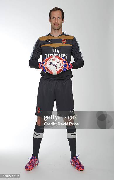 Petr Cech signs for Arsenal Football Club at the Arsenal Training Ground at London Colney on June 26, 2015 in St Albans, England.