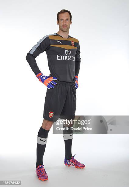 Petr Cech signs for Arsenal Football Club at the Arsenal Training Ground at London Colney on June 26, 2015 in St Albans, England.