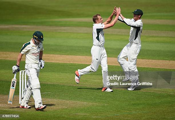 Charles Morris of Worcestershire celebrates the wicket of Chris Read of Nottinghamshire during the LV County Championship match between...