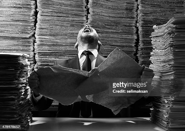 office worker tearing up papers and screaming out - newspaper tear stockfoto's en -beelden