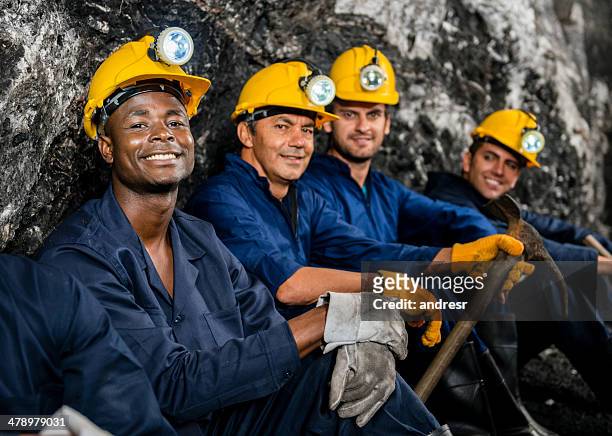 men working at a mine - mining helmet stock pictures, royalty-free photos & images