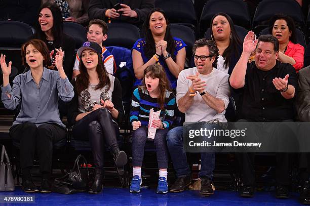 Cheryl Rossum, Emmy Rossum, guest, Mark Ruffalo and Steve Schirripa attend the Milwaukee Bucks vs New York Knicks game at Madison Square Garden on...