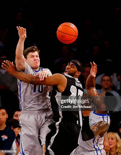 LaDontae Henton of the Providence Friars Grant Gibbs and Austin Chatman of the Creighton Bluejays vie for a loose ball in the second half during the...