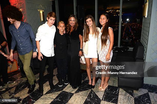 Orienne Collins, son Nicholas Collins and bandmates attend Brit Week Miami opening event at the Viceroy Hotel Spa on March 6, 2014 in Miami, Florida.
