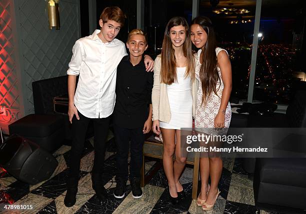 Orienne Collins, son Nicholas Collins and bandmates attend Brit Week Miami opening event at the Viceroy Hotel Spa on March 6, 2014 in Miami, Florida.