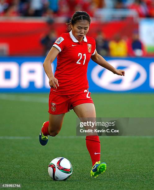 Wang Lisi of China PR against New Zealand during the FIFA Women's World Cup Canada 2015 Group A match between China PR and New Zealand at Winnipeg...