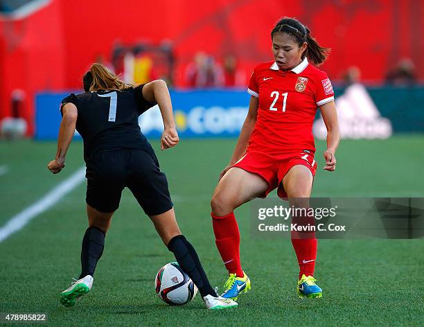 Wang Lisi of China PR against Ali Riley of New Zealand during the FIFA Women's World Cup Canada 2015 Group A match between China PR and New Zealand...