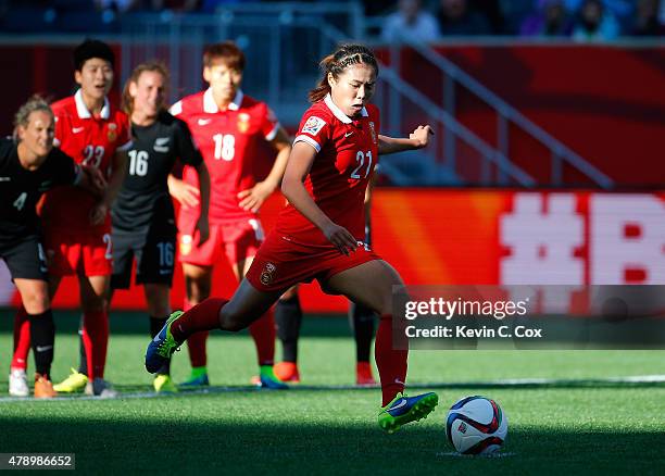 Wang Lisi of China PR scores their first goal on a penalty kick against New Zealand during the FIFA Women's World Cup Canada 2015 Group A match...