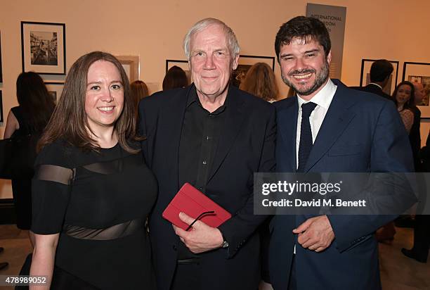 Gemma Cawley, curator Terence Pepper and Luca Dotti attend a private view of new exhibition "Audrey Hepburn: Portraits Of An Icon" at the National...
