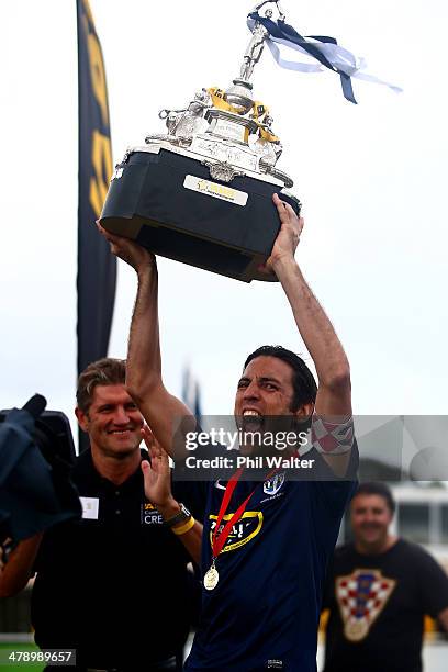 Auckland captain Ivan Vicelich celebrates with the ASB Premiership Trophy following the ASB Premiership match between Auckland and Wellington at...