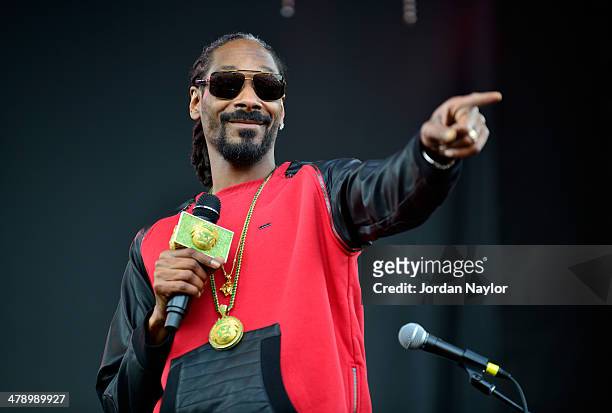 Snoop Dogg performs onstage at the SXSW Outdoor Stage at Butler Park during the 2014 SXSW Music, Film + Interactive Festival at Butler Park on March...