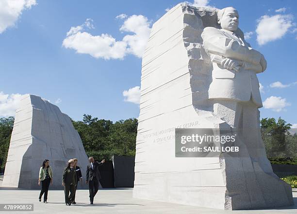 President Barack Obama walks with Brazilian President Dilma Rousseff during a visit to the Martin Luther King, Jr. Memorial in Washington, DC, June...