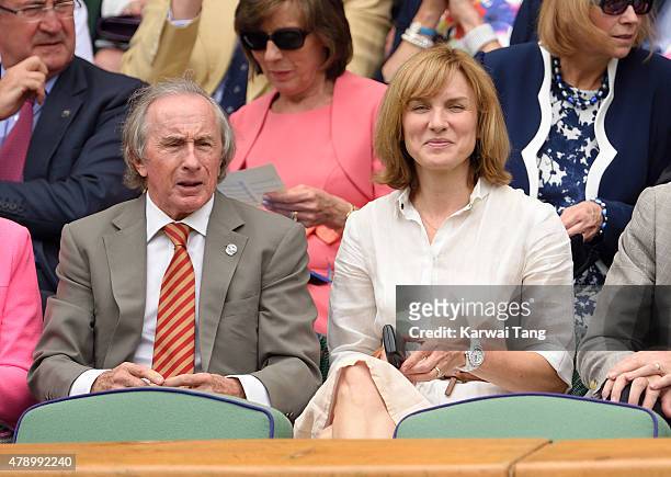 Jackie Stewart and Fiona Bruce attend the Philipp Kohlschreiber v Novak Djokovic match on day one of the Wimbledon Tennis Championships on June 29,...