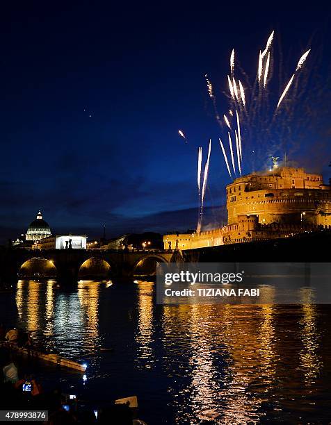 Fireworks burst in the sky over the Castel Sant'Angelo during the traditional 'Girandola', the feast of Romes patron St Peter and Paul, on June 29,...