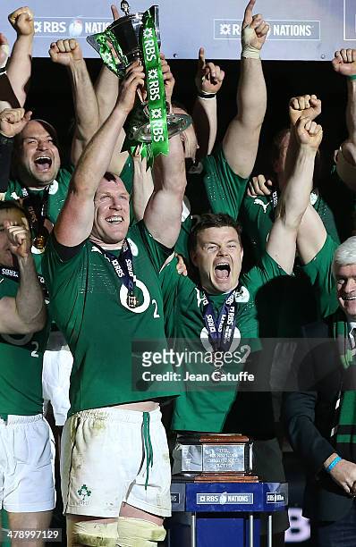 Paul O'Connell of Ireland and Brian O'Driscoll of Ireland celebrates the victory during the trophy ceremonyy after the RBS Six Nations match between...