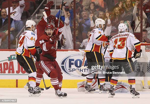 Mikkel Boedker of the Phoenix Coyotes celebrates the game winning powerplay goal by Shane Doan against the Calgary Flames at 8:49 of the third period...