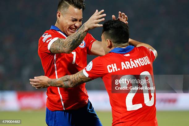 Eduardo Vargas of Chile celebrates with teammate Charles Aranguiz after scoring the opening goal during the 2015 Copa America Chile Semi Final match...