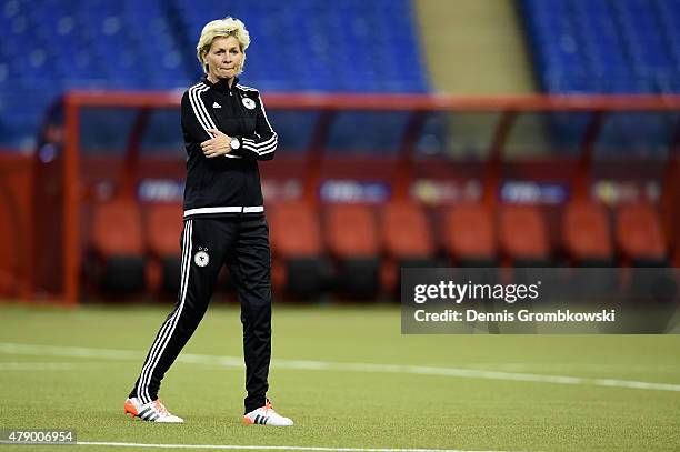 Head coach Silvia Neid of Germany looks on during a training session at Olympic Stadium ahead of their semi final match against the United States on...