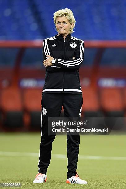 Head coach Silvia Neid of Germany looks on during a training session at Olympic Stadium ahead of their semi final match against the United States on...