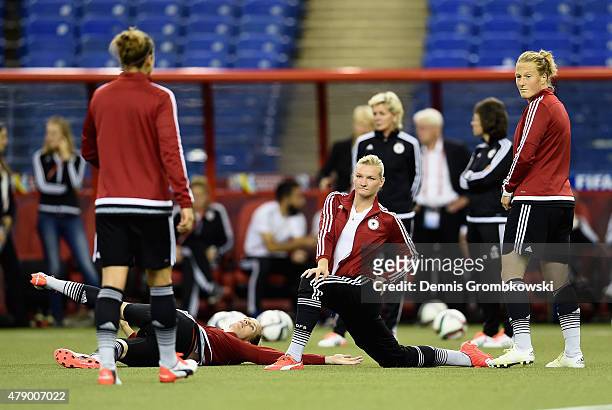 Germany players practice during a training session at Olympic Stadium ahead of their semi final match against the United States on June 29, 2015 in...
