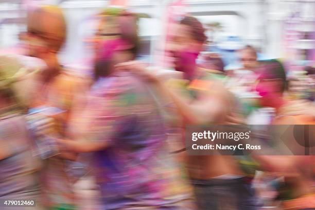 conga line dancing at holi festival of color - conga stock pictures, royalty-free photos & images